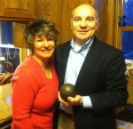 Mark and Jennifer Gibson in 2013, with the shot put that gave them a reason to meet 30 years ago.