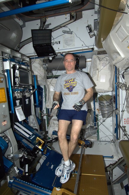Col. Kevin Ford on the International Space Station, honoring athletic trainer Bruce Neischwitz by wearing a Minnesota State Mankato T-shirt.