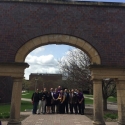 Group photo under the Alumni Arch